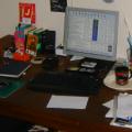 I had to resize this one so you'd see more. This is my living room table a.k.a. my desk. My new flatscreen on it. This is where I surf and slam. The link is my current start page.